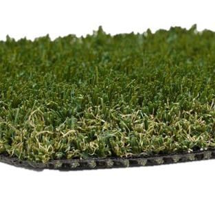 Close-up of artificial grass turf with green blades and a black backing edge