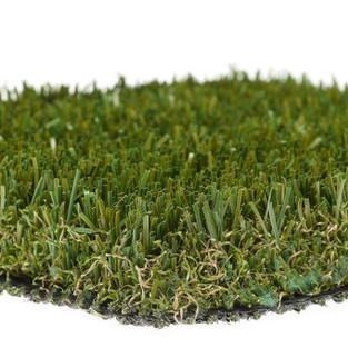 Patch of artificial grass turf with green blades on a white background