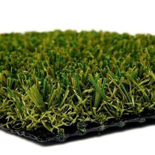 Close-up of green artificial turf grass on a black backing