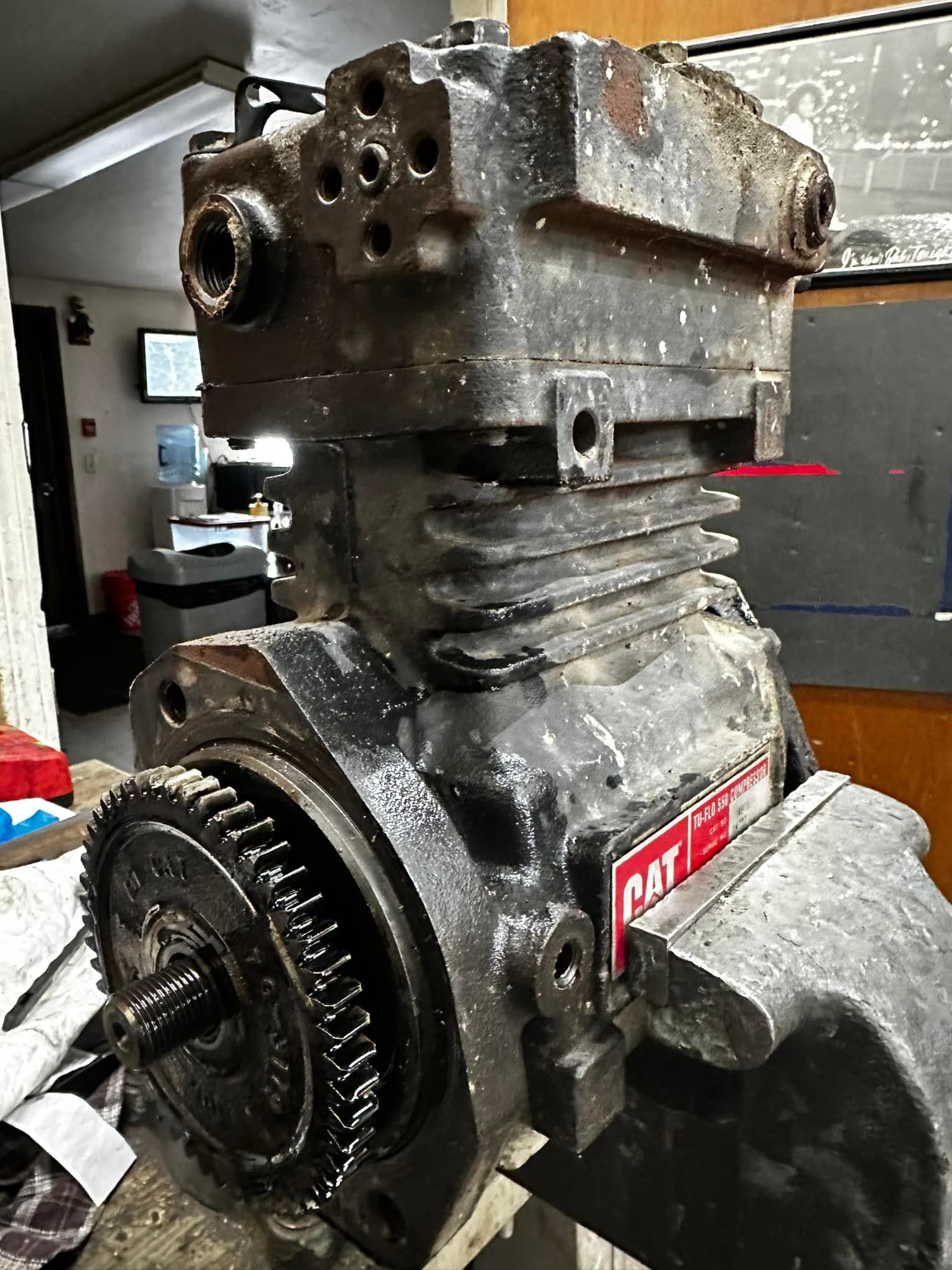 Black Caterpillar air compressor.