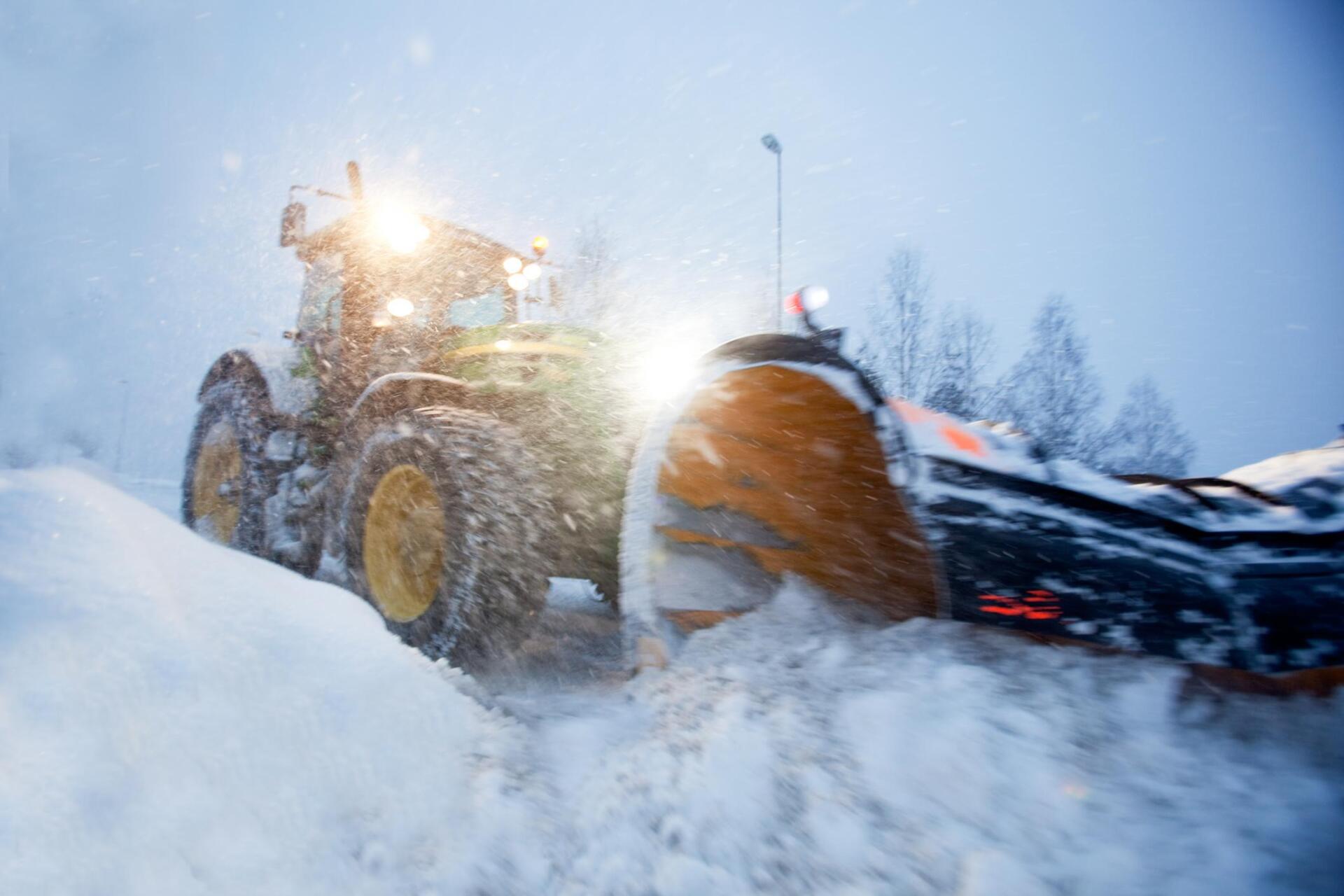 bulldozer shoving the snow