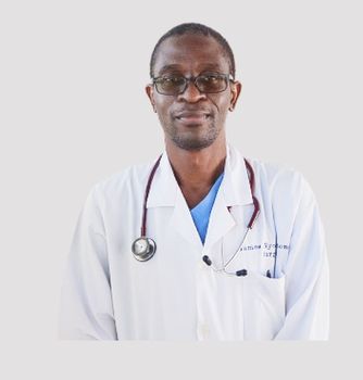 A man in a white coat with a stethoscope around his neck