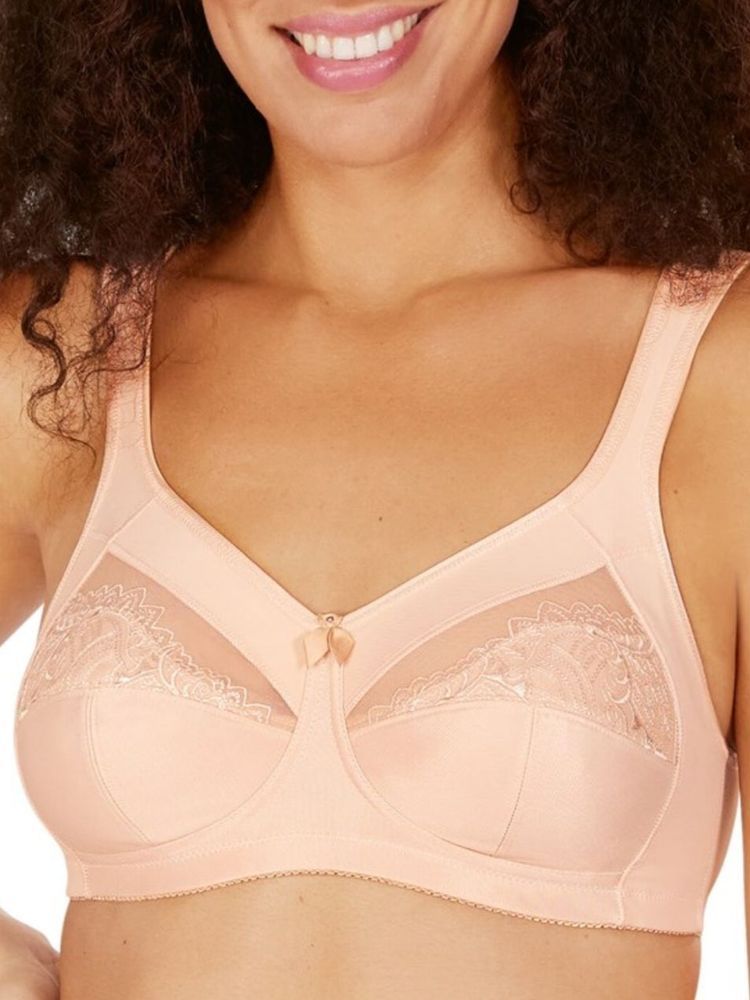 A Woman Wearing a Peach-coloured Full-coverage Bra With Lace Detailing and Bow — Shona's Lingerie in Hermit Park, QLD