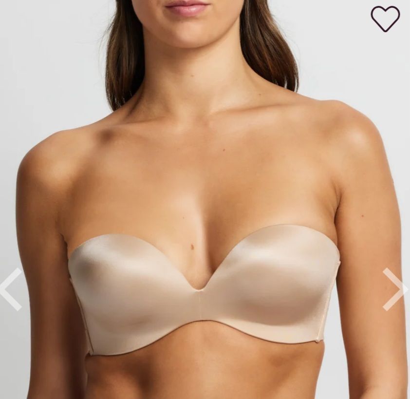 Woman Wearing a Beige Strapless Bra, Posing in a Studio — Shona's Lingerie in Hermit Park, QLD