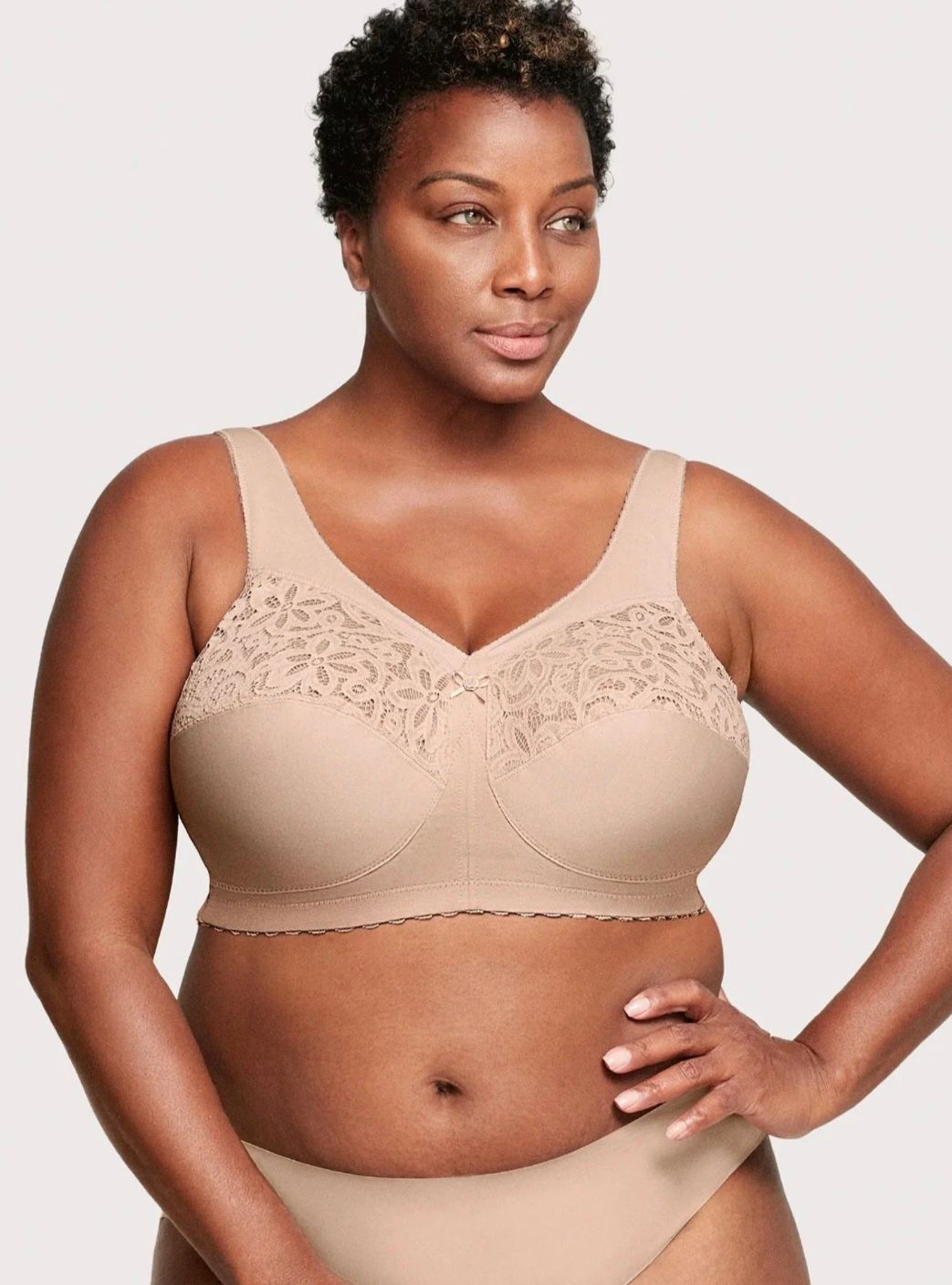 Woman Modeling a Beige Lace Bra and Matching Underwear — Shona's Lingerie in Hermit Park, QLD