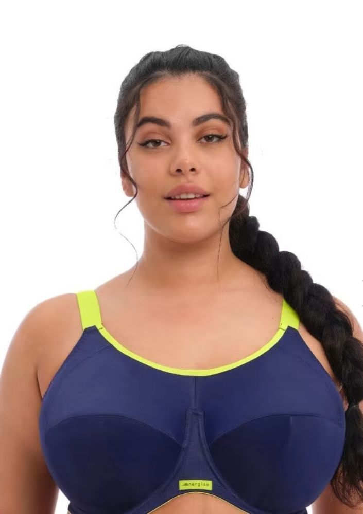 Woman Wearing a Blue Sports Bra With Neon Green Trim — Shona's Lingerie in Hermit Park, QLD