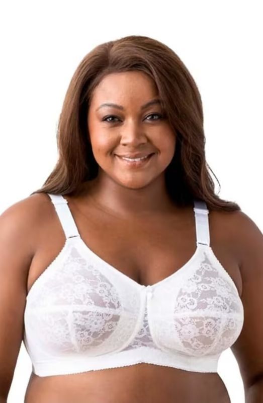 Woman Wearing a White Lace Bra, Smiling — Shona's Lingerie in Hermit Park, QLD