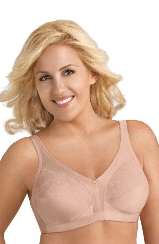 Woman Wearing a Beige Bra, Smiling, Against a White Background — Shona's Lingerie in Hermit Park, QLD