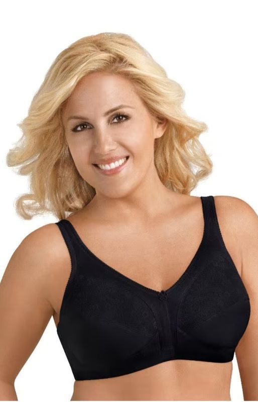Woman With Blonde Hair, Smiling, Wearing a Black Bra — Shona's Lingerie in Hermit Park, QLD