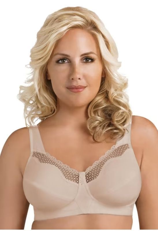 Woman Wearing a Beige Bra With Lace Detailing, Smiling — Shona's Lingerie in Hermit Park, QLD