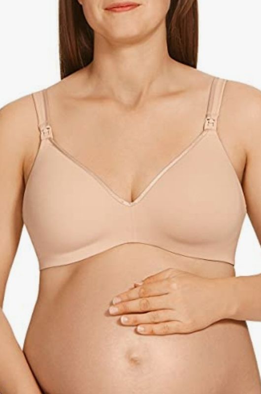 Woman in Nude-coloured Nursing Bra, Hand on Pregnant Belly — Shona's Lingerie in Hermit Park, QLD