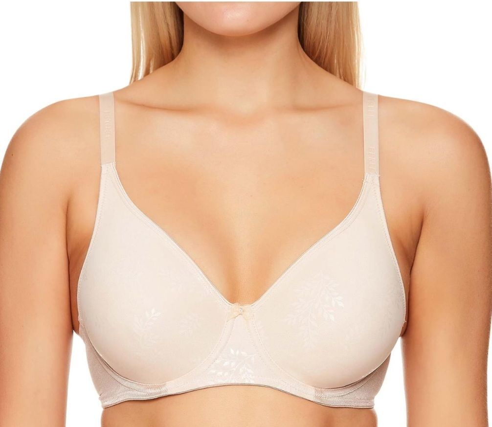 Woman Wearing a Beige Bra With Adjustable Straps, Posing — Shona's Lingerie in Hermit Park, QLD