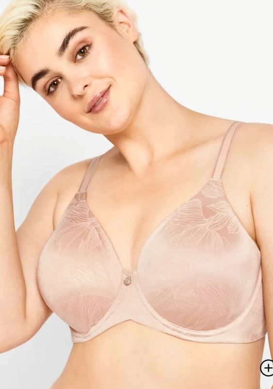 Woman Wearing a Beige Bra, Smiling, Hand on Head — Shona's Lingerie in Hermit Park, QLD