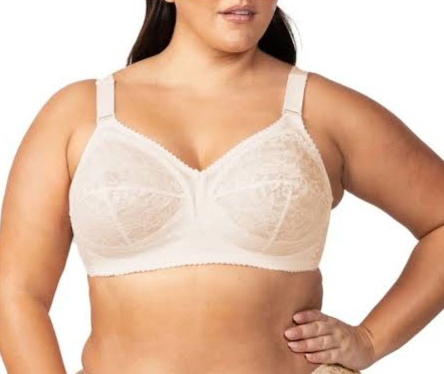 Woman Wearing a Beige Lace Bra — Shona's Lingerie in Hermit Park, QLD