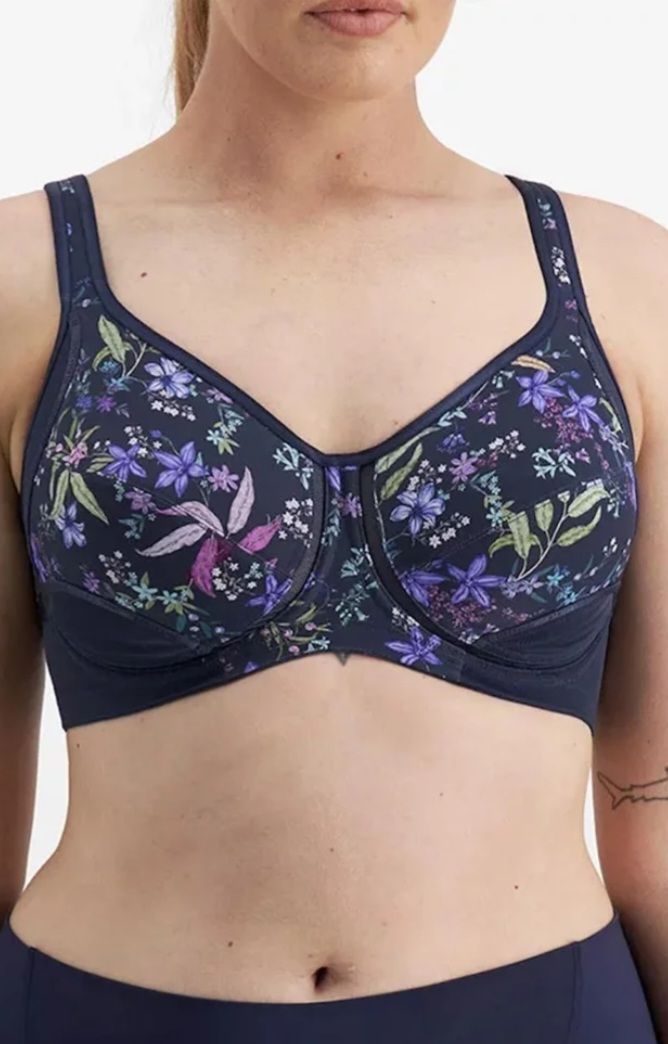 Navy Bra With Floral Pattern; Model's Torso Visible — Shona's Lingerie in Hermit Park, QLD