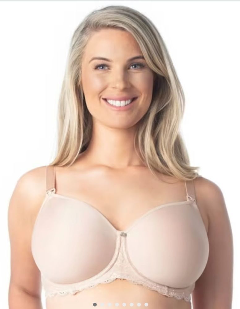 Woman Wearing a Beige Bra, Smiling, With Blonde Hair — Shona's Lingerie in Hermit Park, QLD