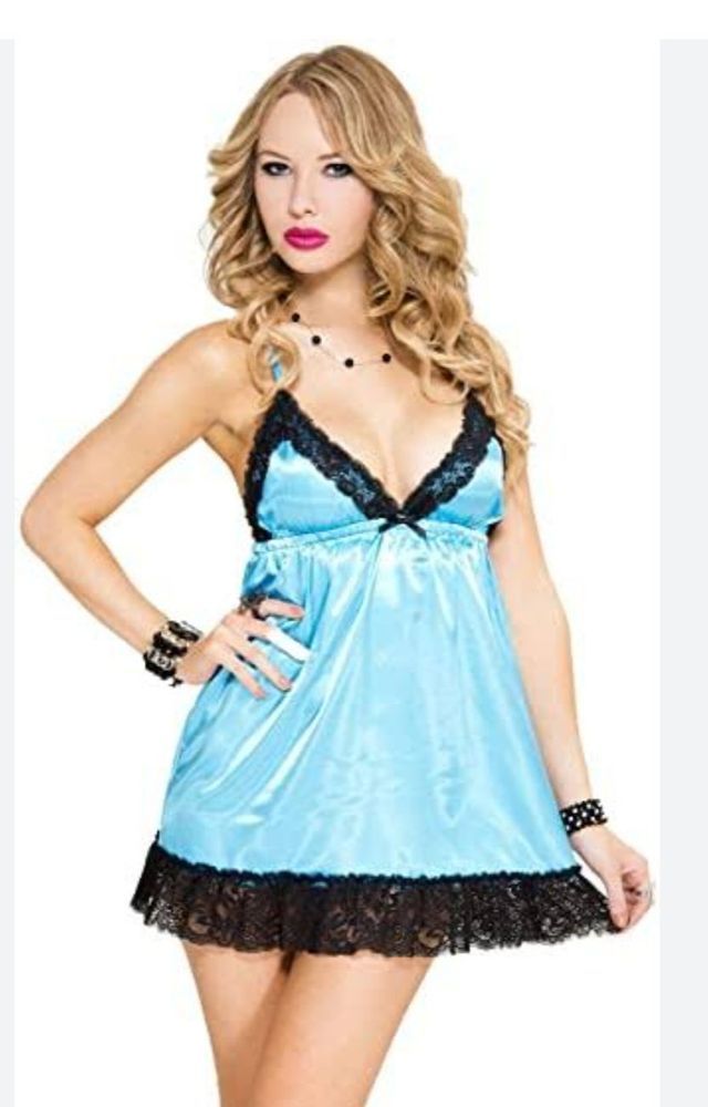 Woman in Blue Satin Babydoll With Black Lace Trim — Shona's Lingerie in Hermit Park, QLD