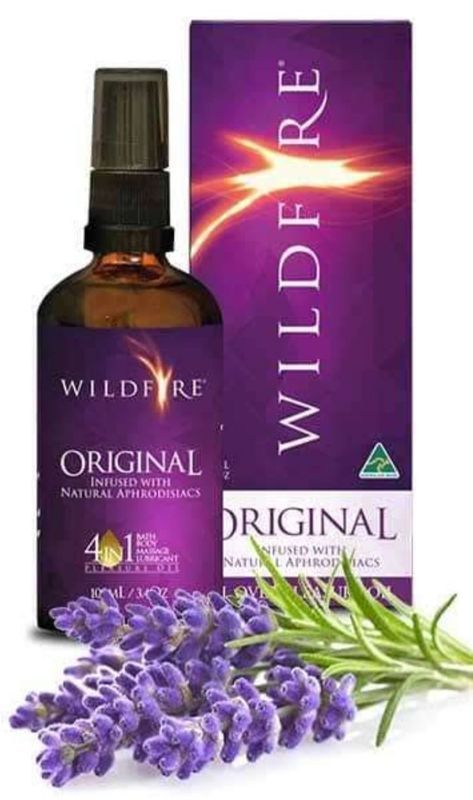 Bottle of Wildfire Original Spray, With Purple Packaging and Lavender Sprigs — Shona's Lingerie in Hermit Park, QLD