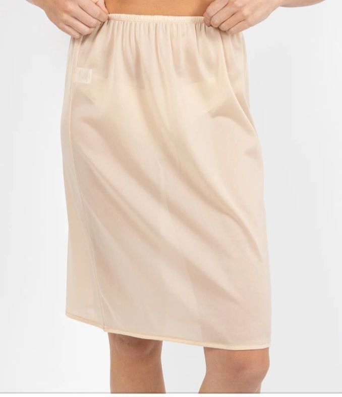 Tan-coloured Half Slip Worn by a Person, the Elastic Waistband Visible — Shona's Lingerie in Hermit Park, Qld