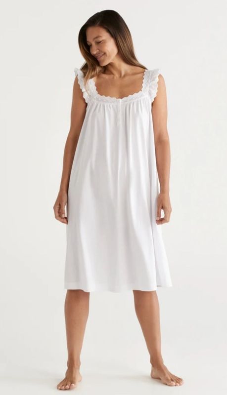 Woman Wearing a White, Sleeveless Nightgown With Lace Trim — Shona's Lingerie in Hermit Park, QLD