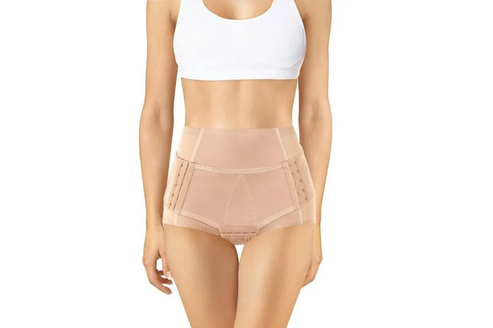 Woman Wearing a Beige High-waisted Shapewear Brief and White Sports Bra — Shona's Lingerie in Hermit Park, QLD