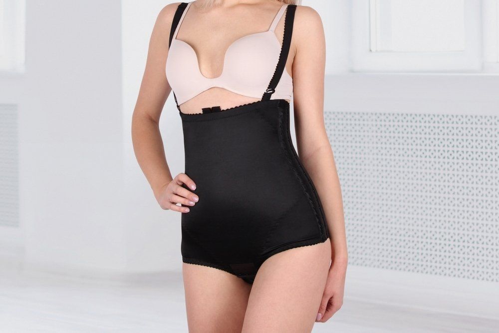 Woman Wearing Black Shapewear With Bra Straps, Standing Indoors — Shona's Lingerie in Hermit Park, QLD