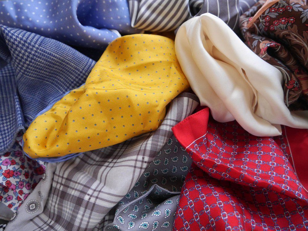 Pile of Assorted Colorful Fabric, Including Yellow Dotted — Shona's Lingerie in Hermit Park, QLD