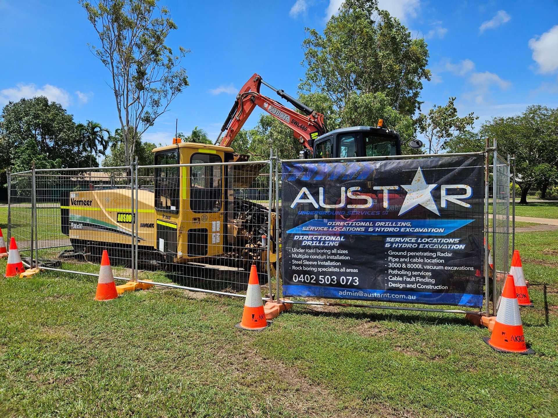 A Construction Site With a Sign That Says Austar on It — Austar Underground Services in Girraween, NT