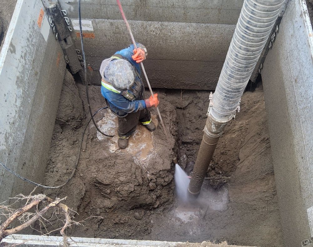 Worker Doing Hydro Excavation in Darwin