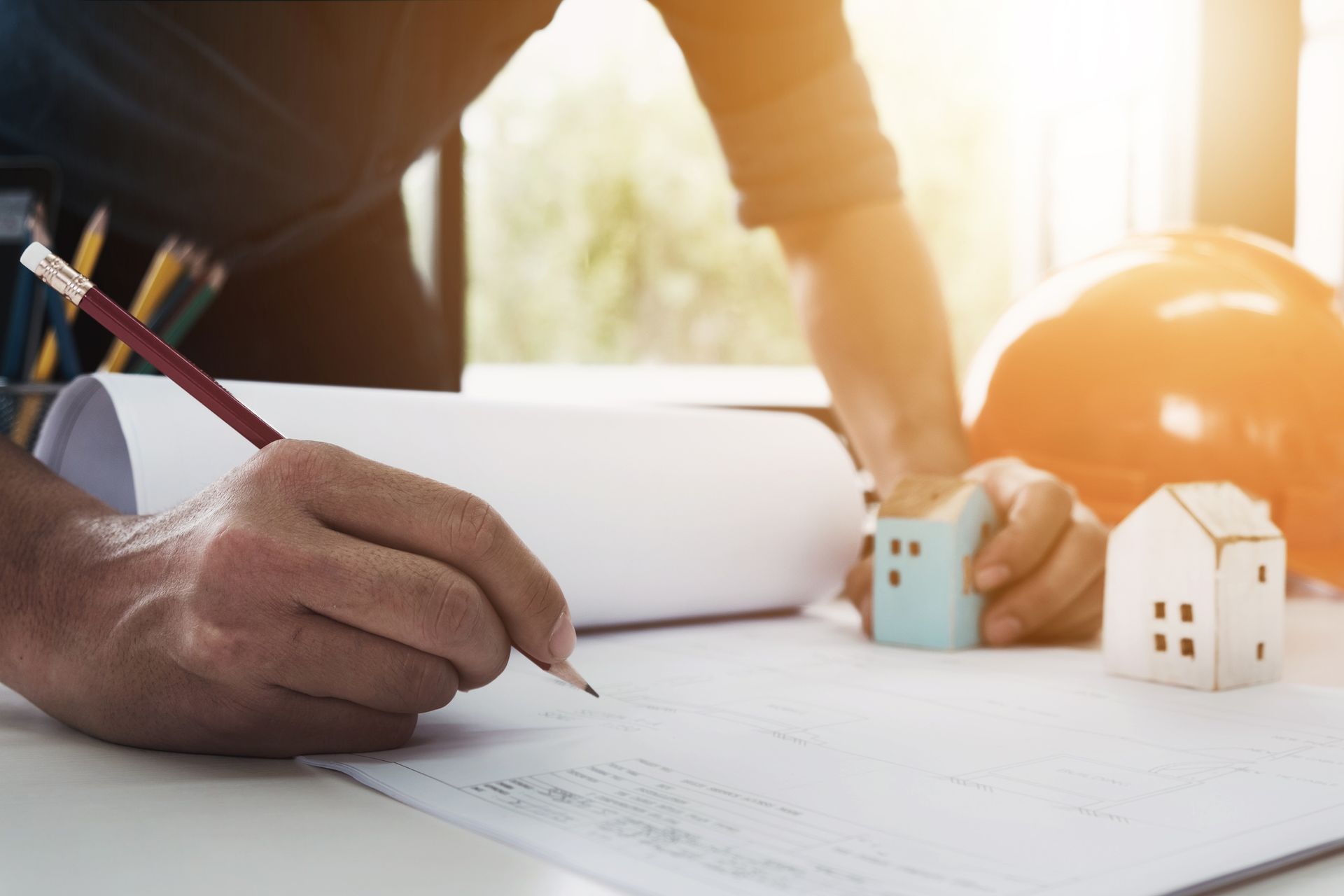 Engineer Drawing a Blue Print Design Building — Sydney, NSW — 10 Star Building Assessments