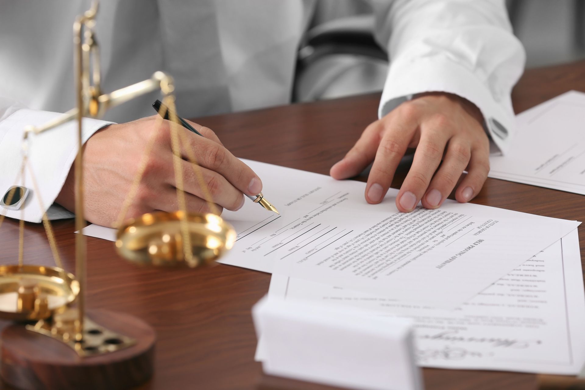 Attorneys signing will and trust.