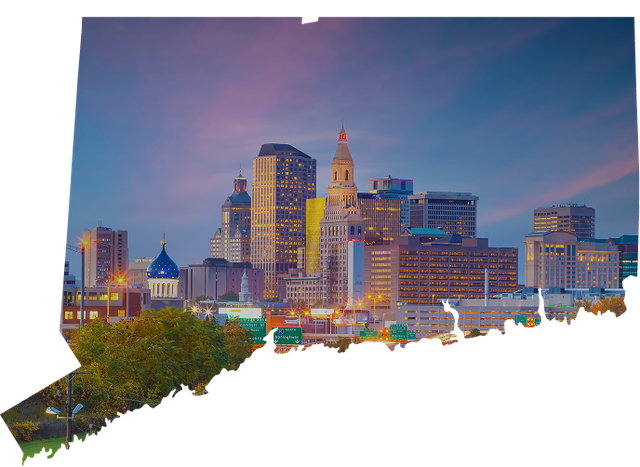 A map of the state of connecticut with a city skyline in the background.