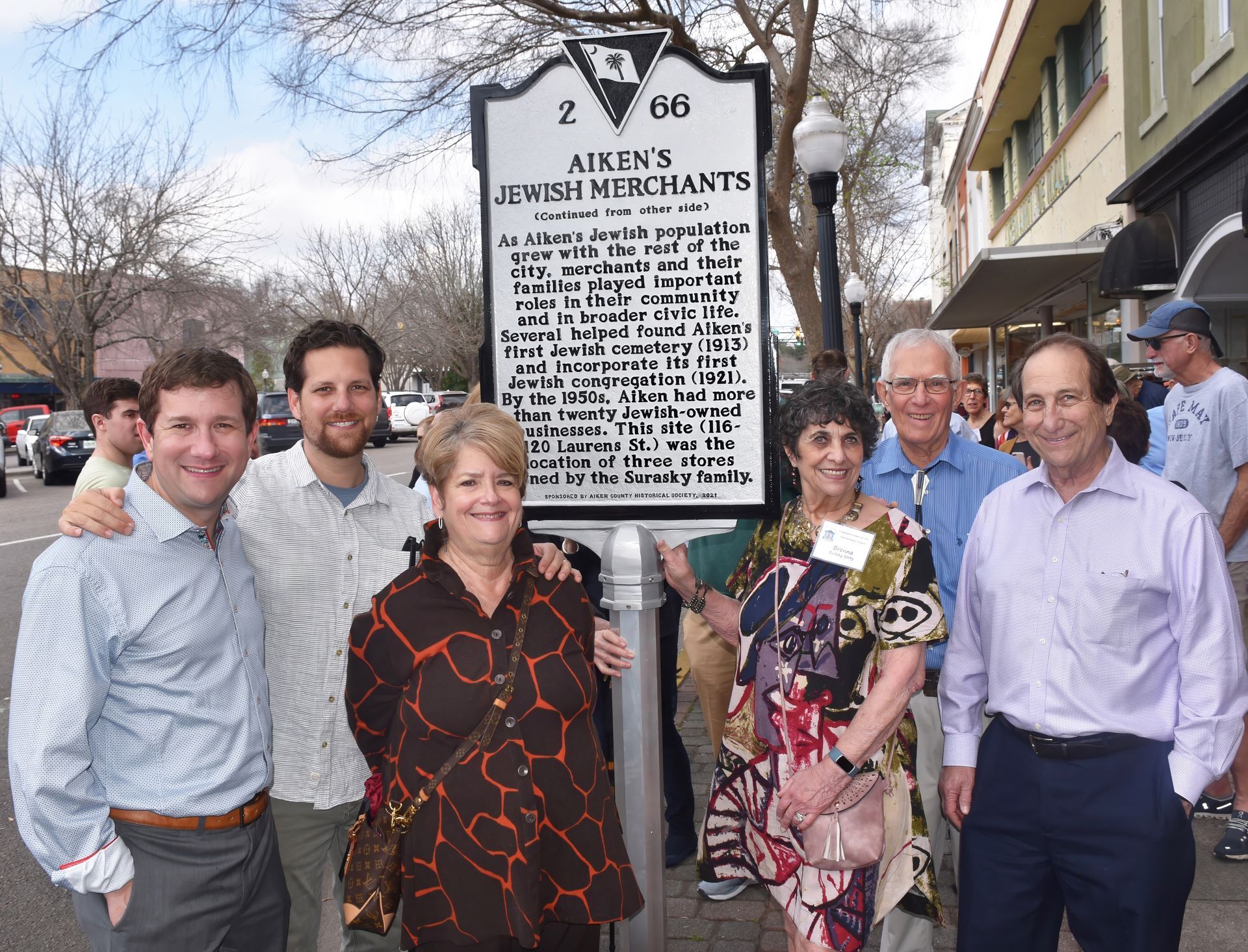 Our centennial celebration with a gathering of our folks near our sign