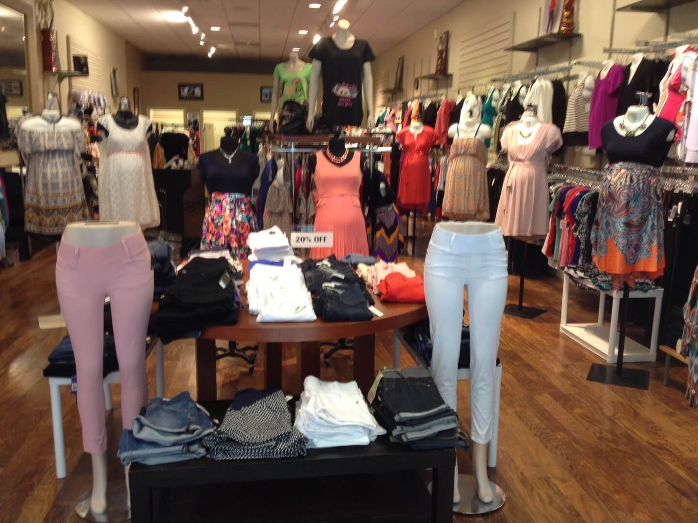 A store filled with lots of clothes and mannequins