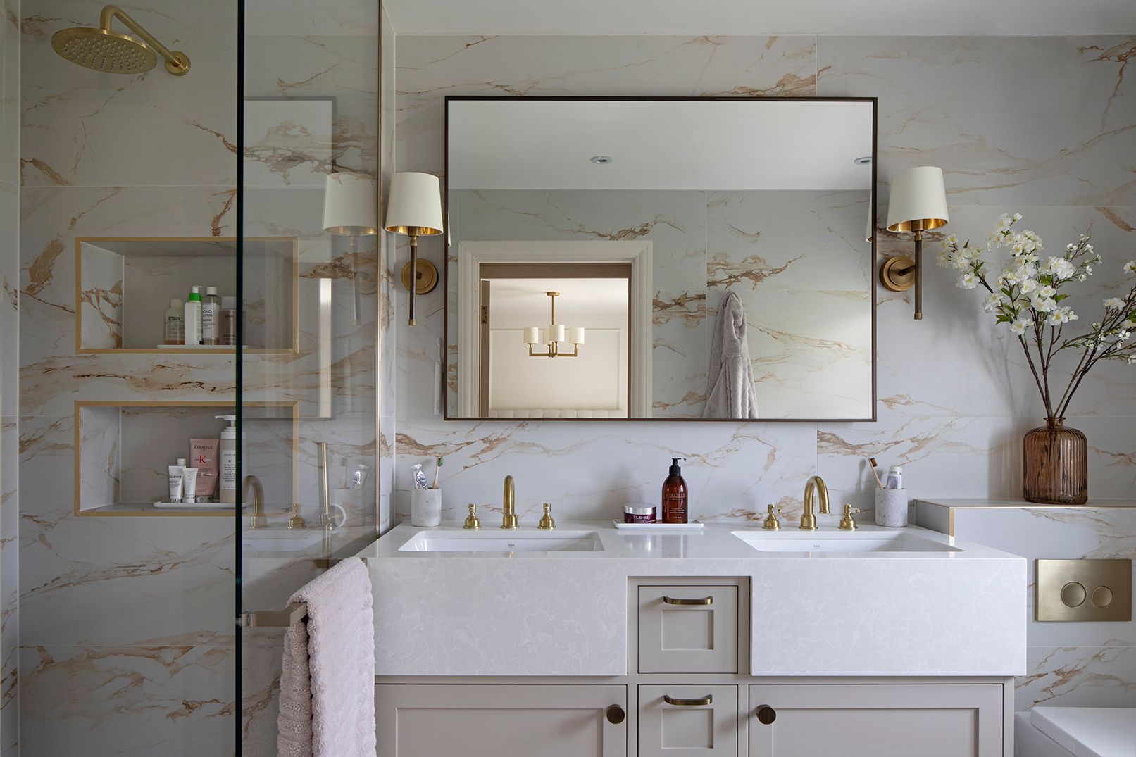 Double vanity with shaker-style cabinetry, black-framed mirror, and glass shower screen in Hertford ensuite by Elisa Design