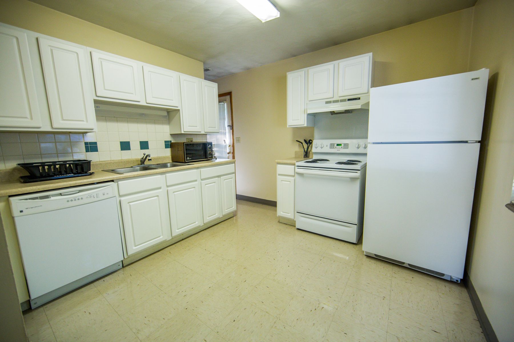 Photo showing a kitchen, taken from within the kitchen