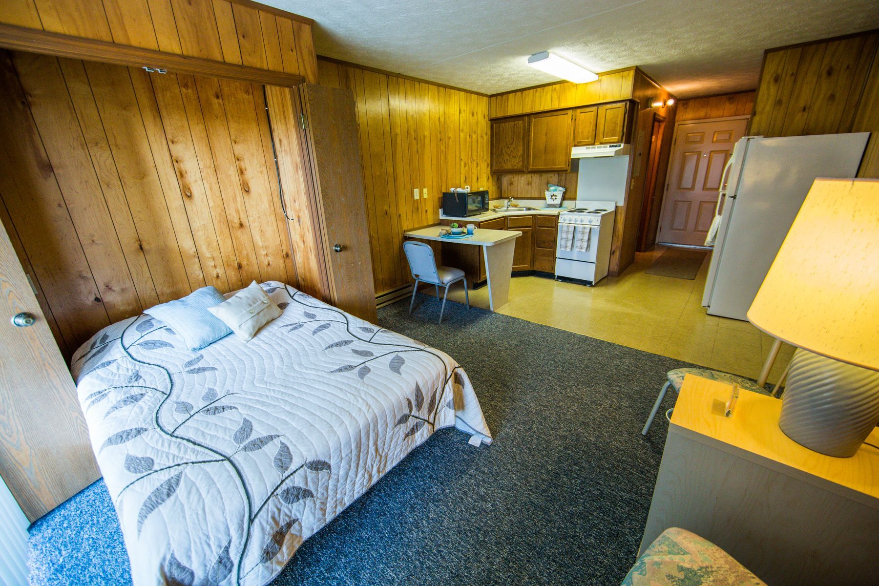 Photo showing a studio with the living room area in the foreground