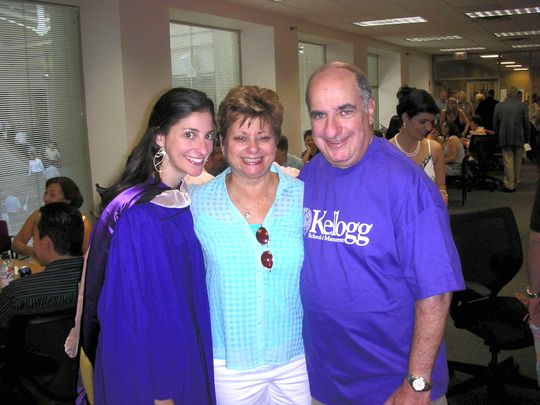Susie Newman, with her parents at her college graduation from Kellogg Business School