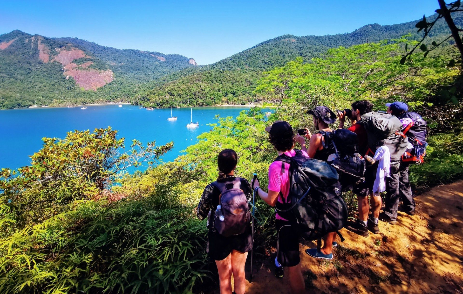 Hikers observing the views and taking pictures