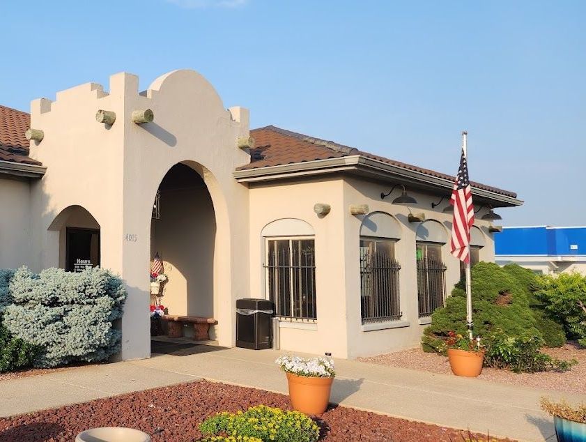 A house with a flag in front of it