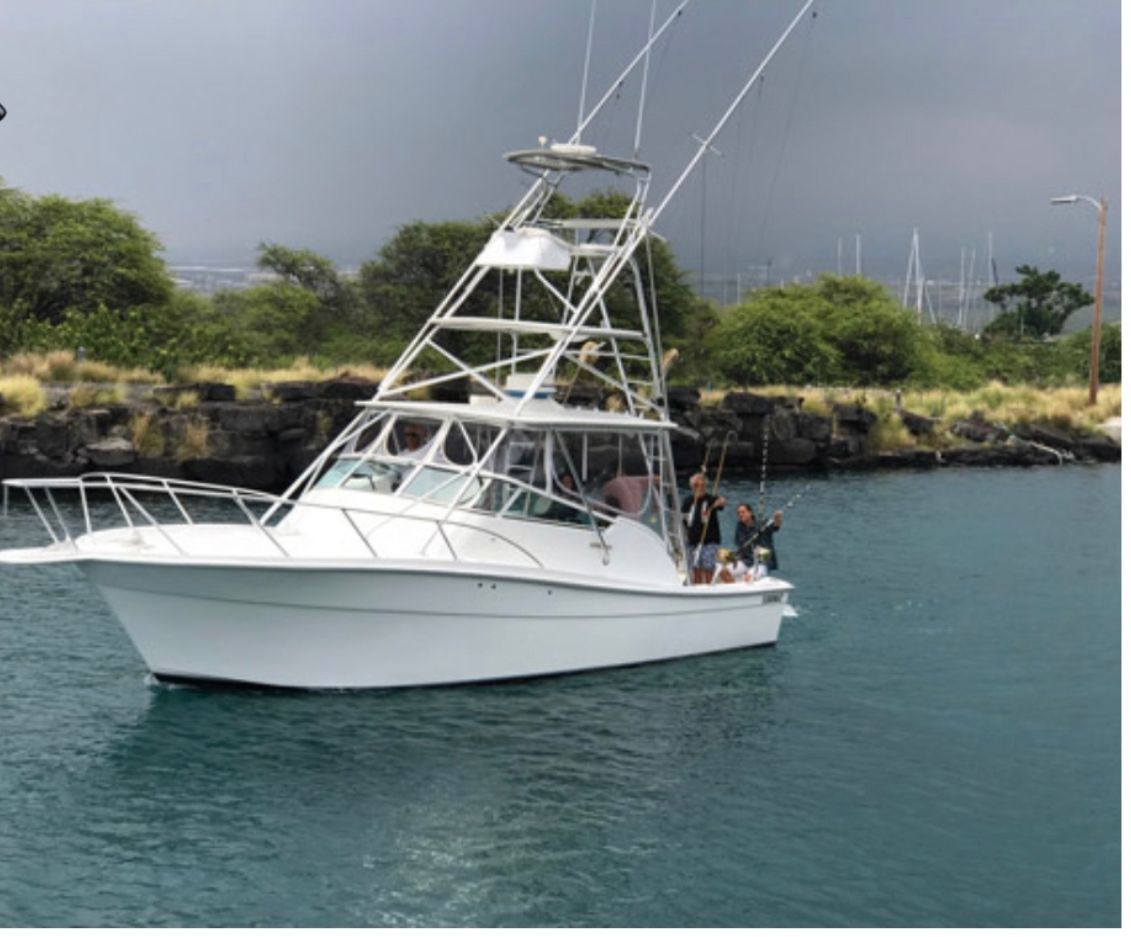 Skillet Sportfishing's boat docked at Honokohau Harbor in Kailua-Kona
