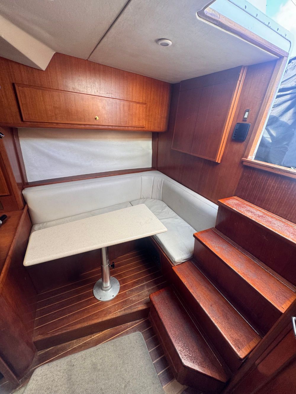 There is a table and stairs in the cabin.
