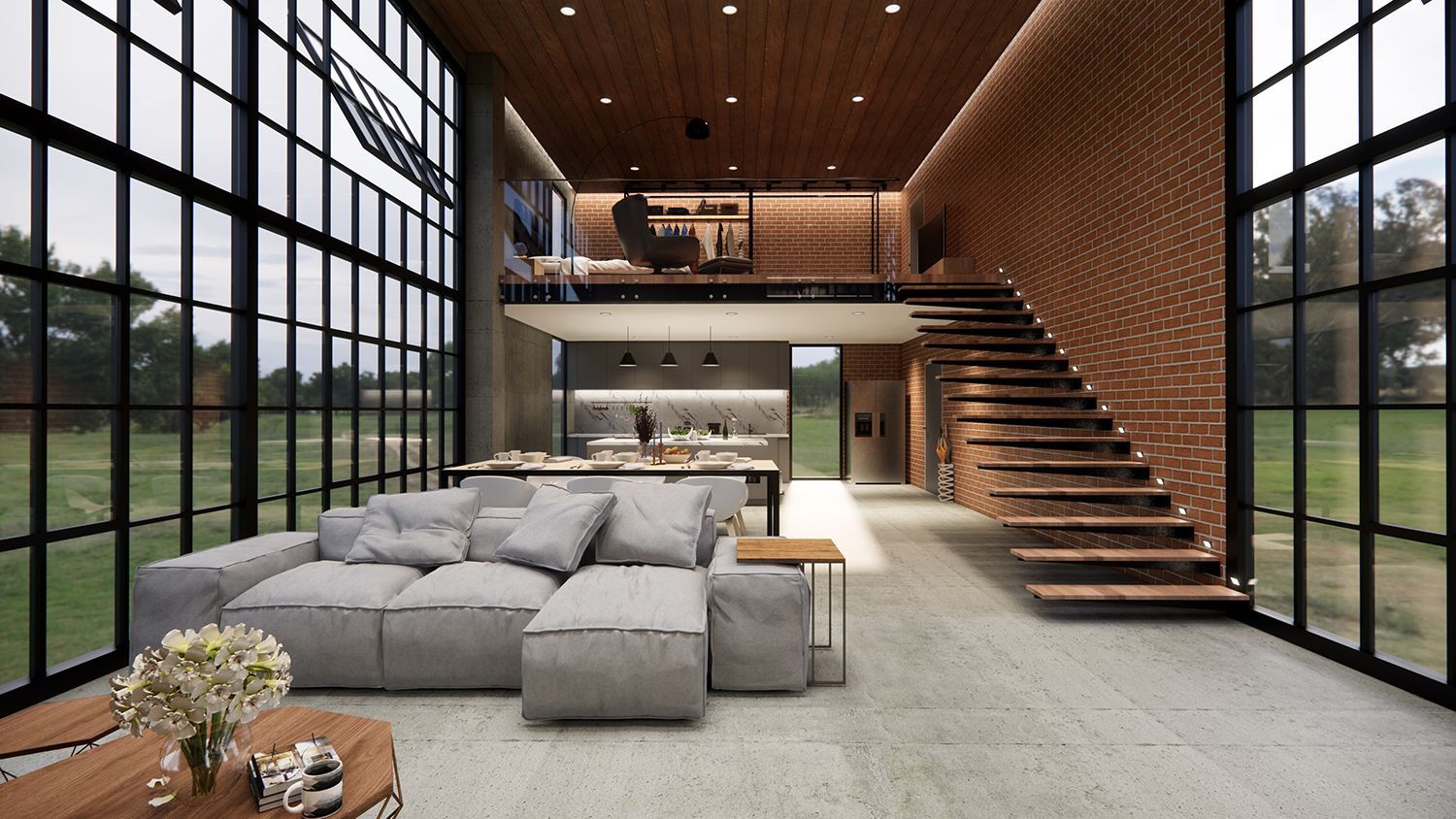 Modern loft living room with gray sectional, brick walls, tall windows, and an open staircase/loft. Modern loft living room with gray sectional, brick walls, tall windows, and an open staircase/loft.