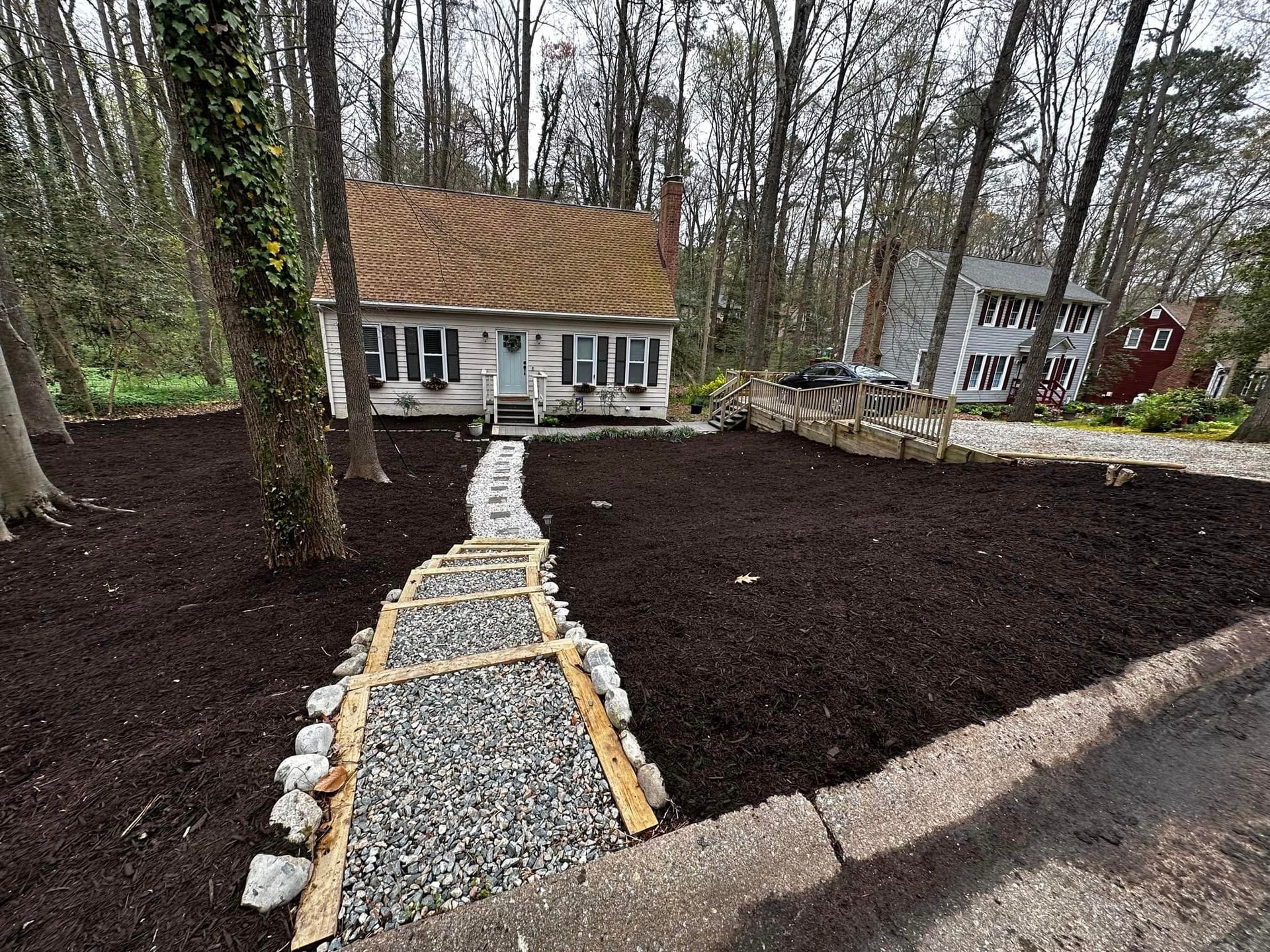 A path leading to a house in the woods