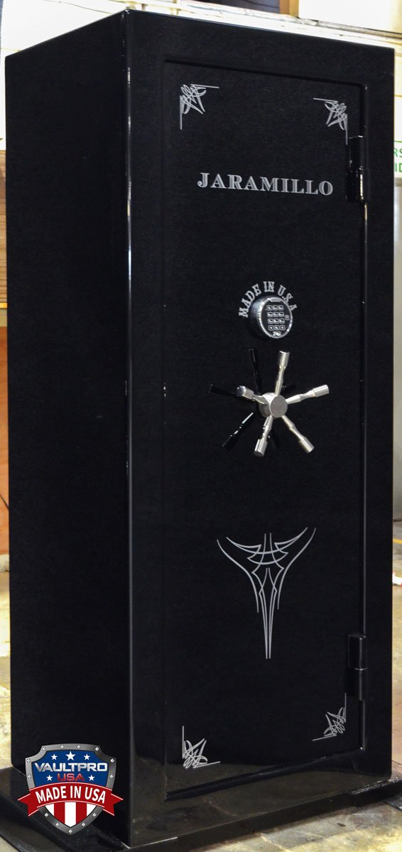 A black safe with a starfish on it is sitting on a table.