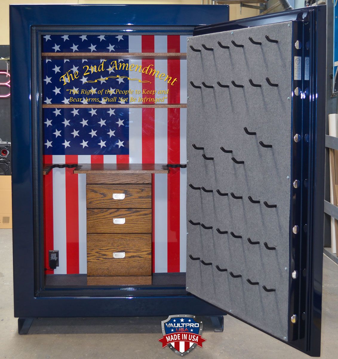 Custom American Eagle 750 model with gun racks, oak cabinet and cedar lined shelves. American flag and 2nd amendment on back wall.