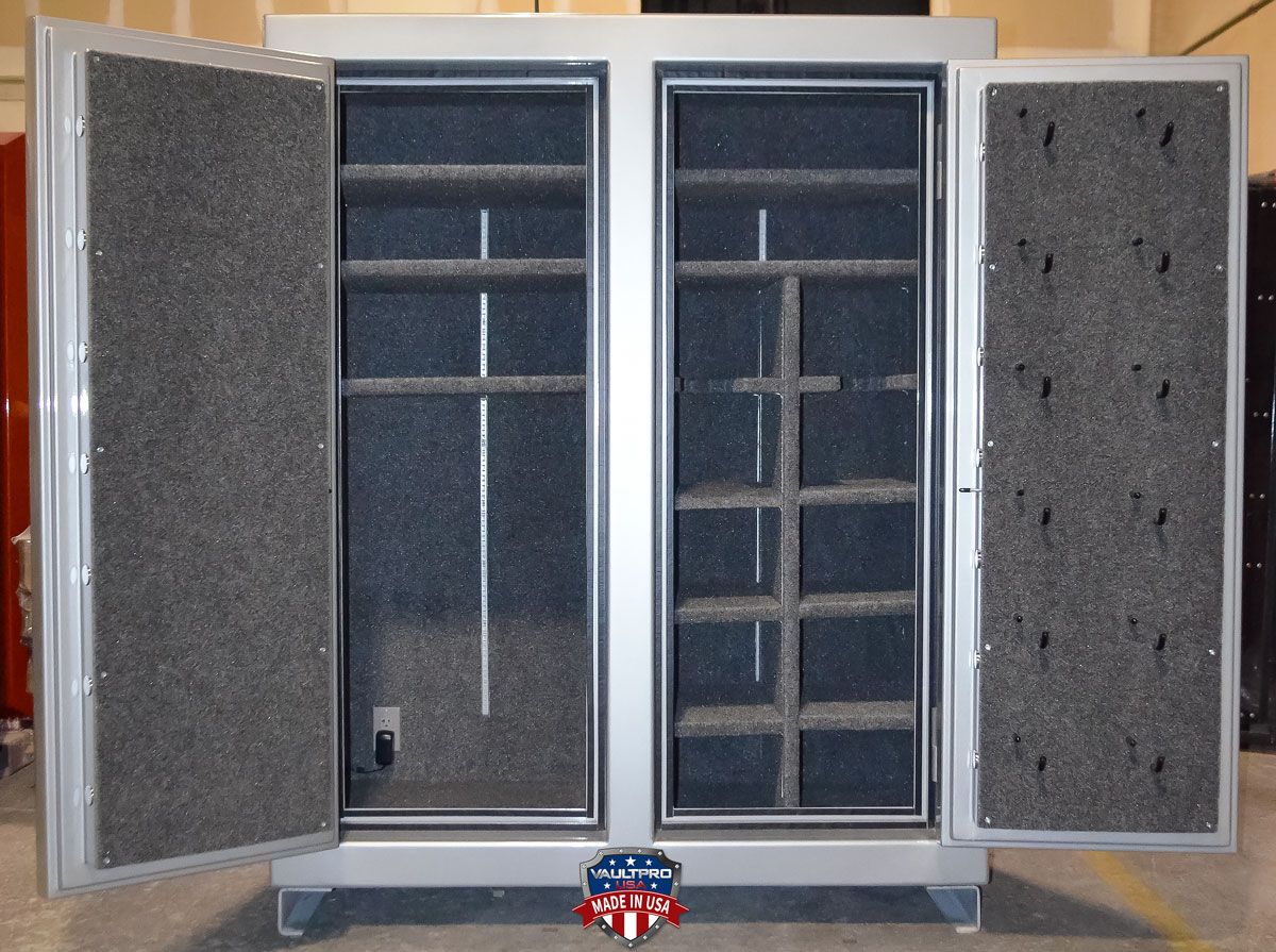 Double Door 762 model safe interior showing fully configurable shelves and gun racks. This safe also features interior lighting, electrical outlet and option pistol peg door backing.
