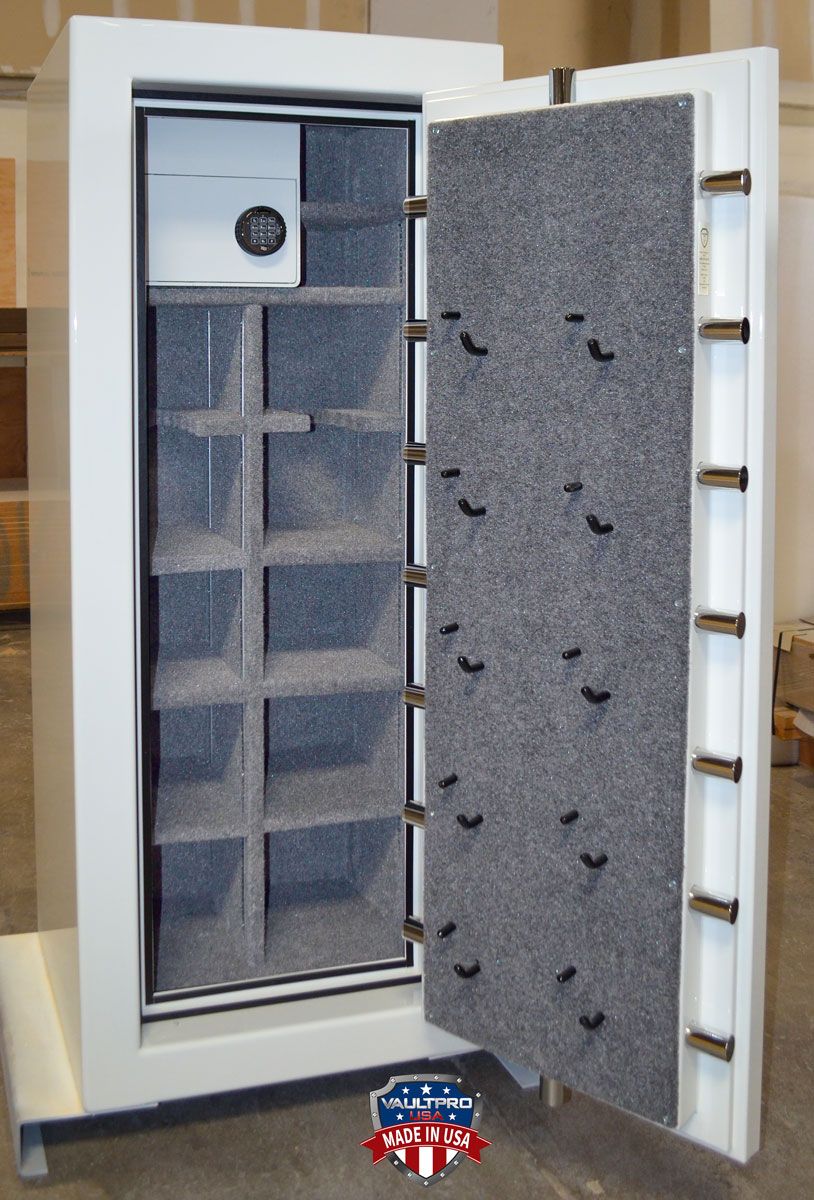 Custom mid-size safe interior with safe in safe and pistol peg handgun holders.  Finished in diamond white gloss finish. Made in USA by Vault Pro