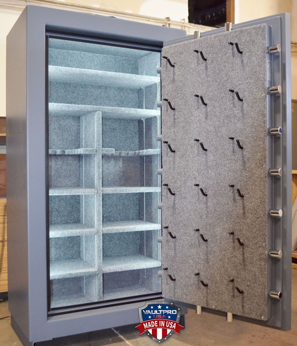 Open gray commercial freezer with shelves and a textured door seal inside a storage area