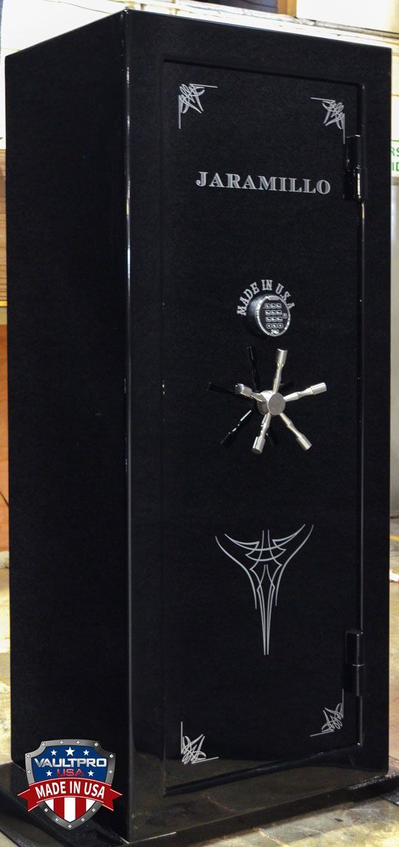 A black safe with a starfish on it is sitting on a table.